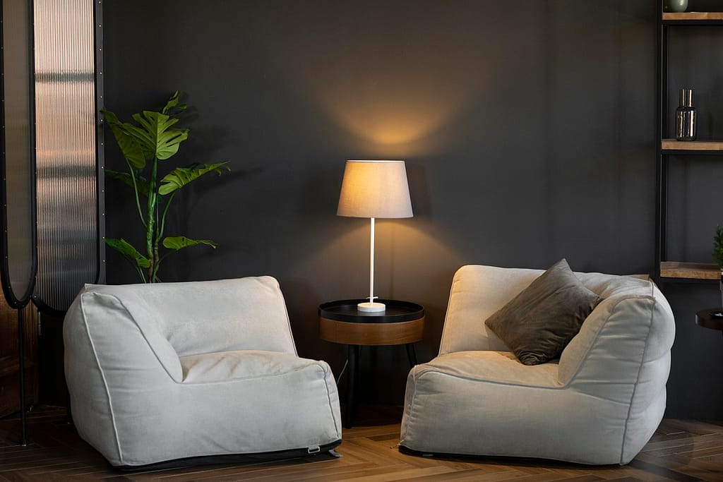 Lighting sets the mood of a room. Relying solely on overhead lighting can create harsh shadows. Consider using a mix of task, ambient, and accent lighting.